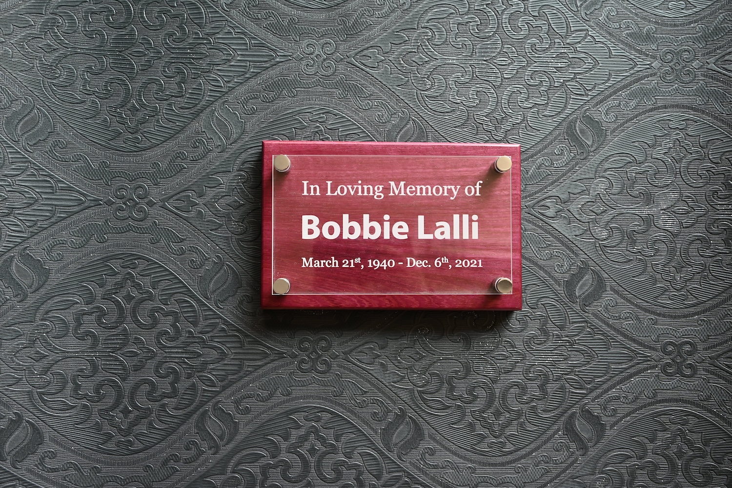Acrylic engraving with standoffs on wood